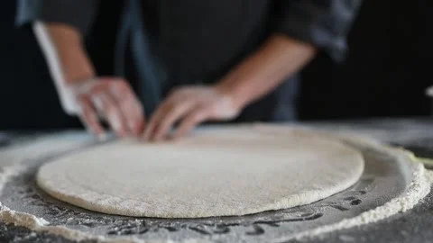The chef is preparing pizza. close-up video of the cooking process Stock Footage 235884886