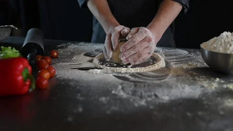 The chef is preparing pizza. close-up video of the cooking process Stock Footage 235884905