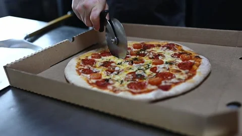 The chef is preparing pizza. close-up video of the cooking process Stock Footage 235884915