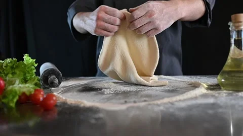 The chef is preparing pizza. close-up video of the cooking process Stock Footage 235884927