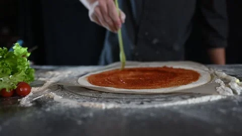 The chef is preparing pizza. close-up video of the cooking process Stock Footage 235884937
