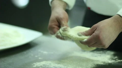 Chef preparing a pizza Stock Footage 61851375