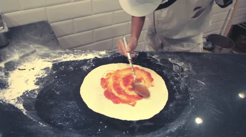 Chef preparing pizza in kitchen Video stock 65325273