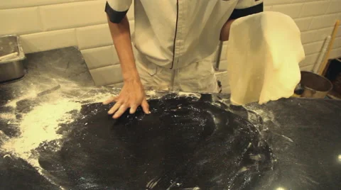 Chef preparing pizza in kitchen Stock Footage 65327134