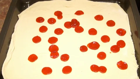 Chef preparing pizza. Making pizza. Cooking process. Cooking pizza. Ketchup Stock Footage 98124918