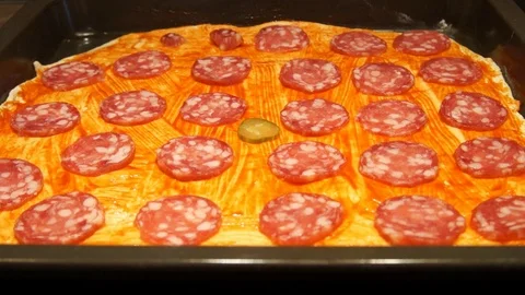 Chef preparing pizza. Making pizza. Cooking process. Cooking pizza. Cucumber Stock Footage 98125157