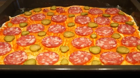 Chef preparing pizza. Making pizza. Cooking process. Cooking pizza. Tomatoes Stock Footage 98125249