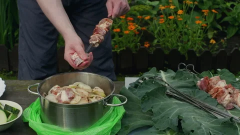 Chef preparing pork meat and onion skewers for barbecue grilling Stock Footage 301276917