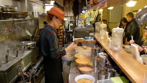 Chef preparing ramen noodle to customers in Japan Stock Footage 132014537