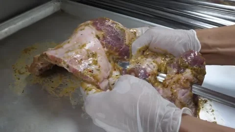 Chef Preparing Raw Pork Ribs with Dry Rub Seasoning Stock-Footage 332811357