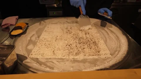 Chef Preparing Rolled Ice Cream on Cold Plate Stock Footage 345293401