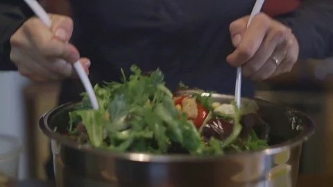 Chef preparing salad in kitchen at restaurant Stock Footage 83861570