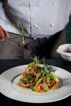 The chef is preparing a salad Stock Photos