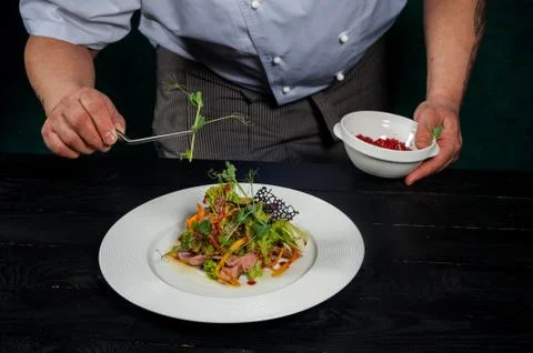The chef is preparing a salad Stock Photos