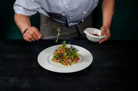 The chef is preparing a salad Stock Photos