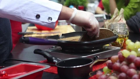 Chef preparing sandwich with toasted bread Stock Footage 73425821