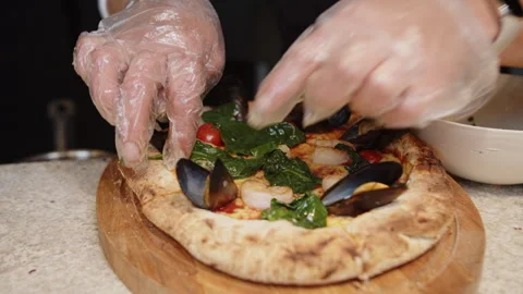 Chef Preparing Seafood Pizza with Fresh Toppings Stock Footage 301530432