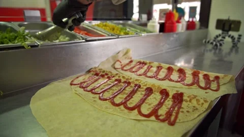 Chef preparing shawarma Stock Footage 188465302