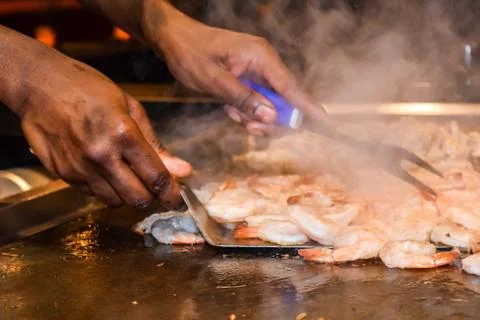 Chef preparing shrimp Stock Photos