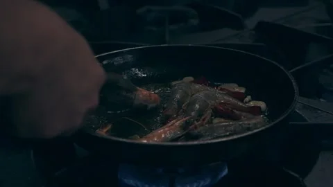Chef Preparing Shrimps in a Pan Slow Motion Stock-Footage 141201761