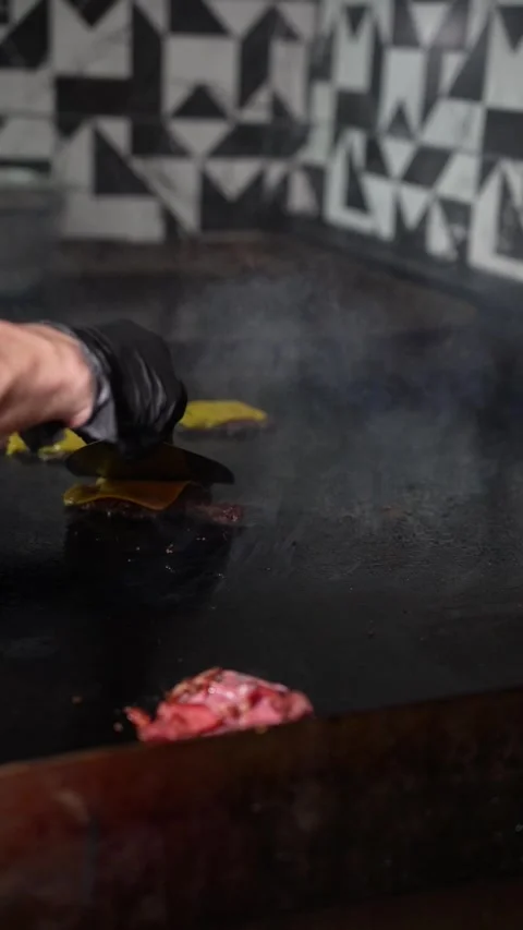 The chef is preparing smash burgers. Stock Footage 294956054