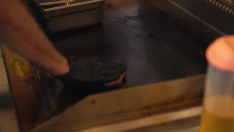 The chef is preparing smash hamburgers Stock Footage 294955559