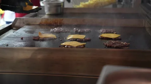The chef is preparing smash hamburgers Stock Footage 294955768