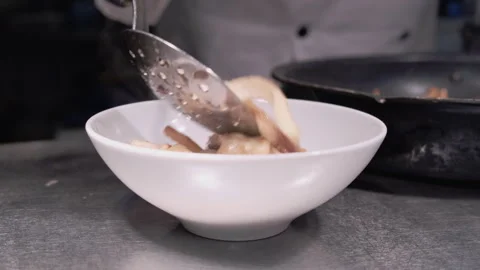 Chef Preparing Starter Course at the Pass Stock Footage 245970038