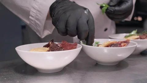Chef Preparing a Starter Course at the Pass. Stock Footage 245970285