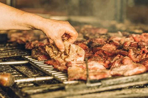 Chef Preparing Steak on the Grill Stock Photos