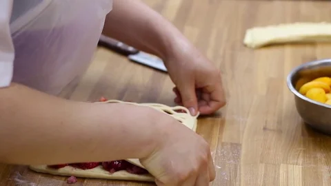 Chef preparing a tasty berry pie 스톡 동영상 74421810