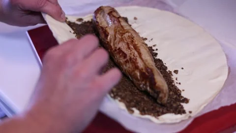 Chef preparing traditional beef wellington recipe Stock Footage 335097729