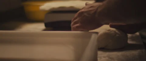 Chef preparing traditional pizza dough with his hands, slowly kneading dough. Stock Footage 146919191