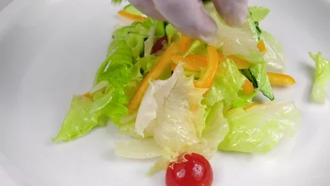 Chef preparing a vegetable or vegetarian salad Stock Footage 84260953