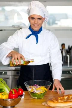 Chef preparing the vegetable salad Stock Photos