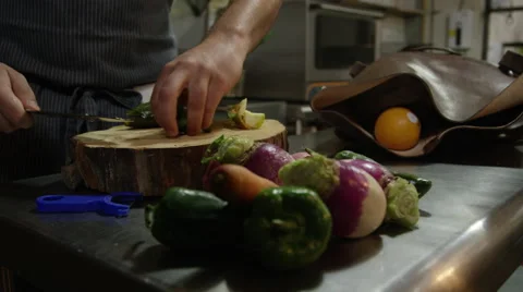 Chef preparing vegetables in kitchen Stock Footage 68499637