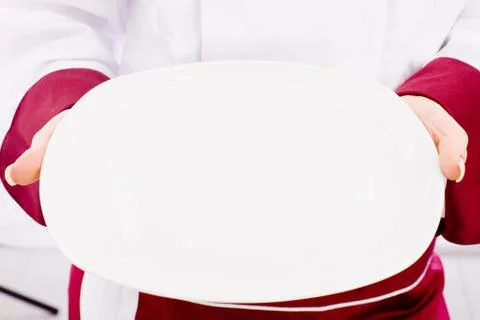 Chef presenting her dish Stock Photos