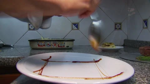 Chef presenting a meal on plate Stock Footage 54591900