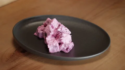Chef presents a delicious beet dish appetizer Stock Footage 153335290
