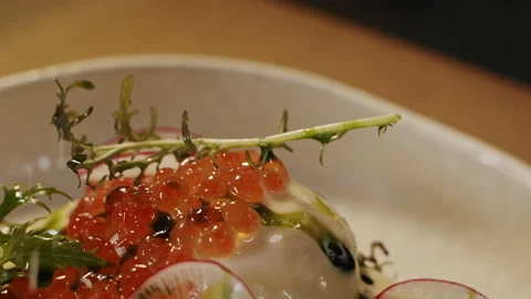 The chef presents a freshly cooked benedict brioche sandwich with salmon 스톡 동영상 151295488