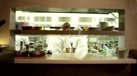 Chef pressing service bell on kitchen counter. Stock Footage 64119356