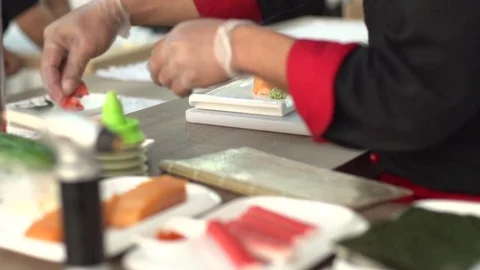 Chef is Proposing Sushi Stock Footage 74596863