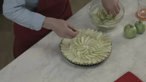 Chef Put Apple Cut Slices on Plate for Cook Pie Stock Footage 164018299