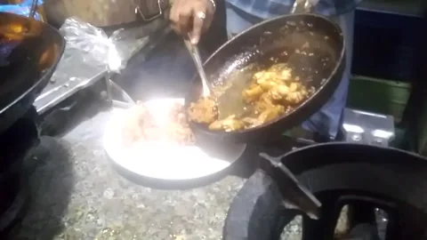 Chef Put A Indian Dish Fried Chicken in White Plate at Restaurant Stock Footage 162659789