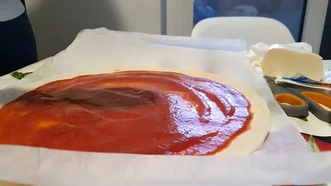 Chef put mozzarella like rain Stock Footage 127894677