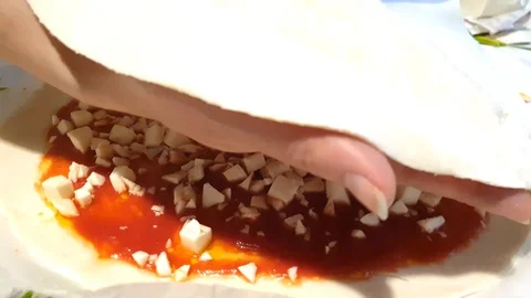 Chef put tomatoes sauce Stock Footage 127893308