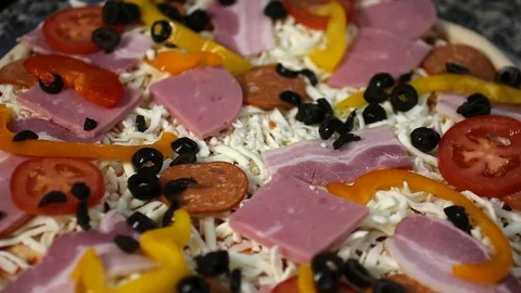 Chef puts black olives on pizza. Stock Footage 87636029