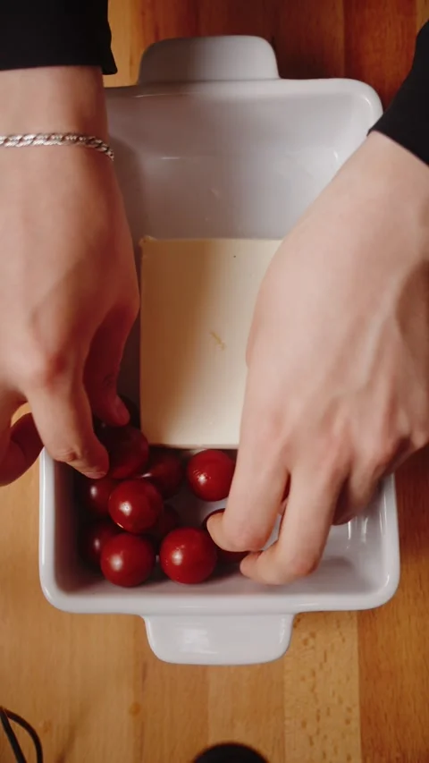 Chef puts Cherry Tomatoes in a Baking Dish 스톡 동영상 283252049
