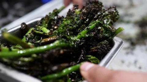 Chef Puts Cooked Vegetables on Container Stock-Footage 128927083