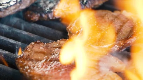 Chef puts a delicious piece of meat on the grill Stockbeeldmateriaal 108350148